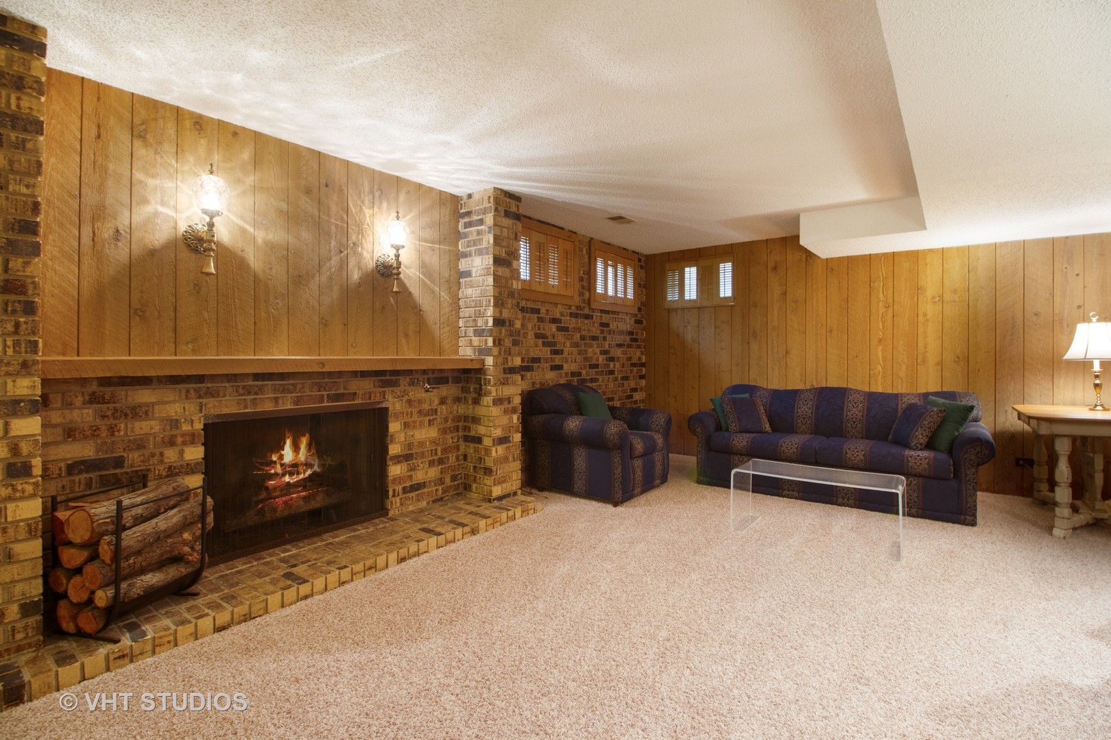 517 Aberdeen Road Frankfort, IL 60423 - Photo 25 of 30 a living room with furniture a fireplace and a flat screen tv