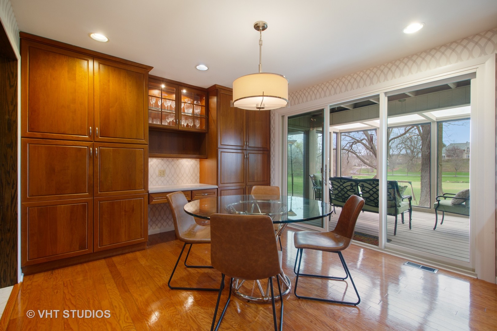 517 Aberdeen Road Frankfort, IL 60423 - Photo 8 of 30 a dining room with furniture a chandelier and wooden floor