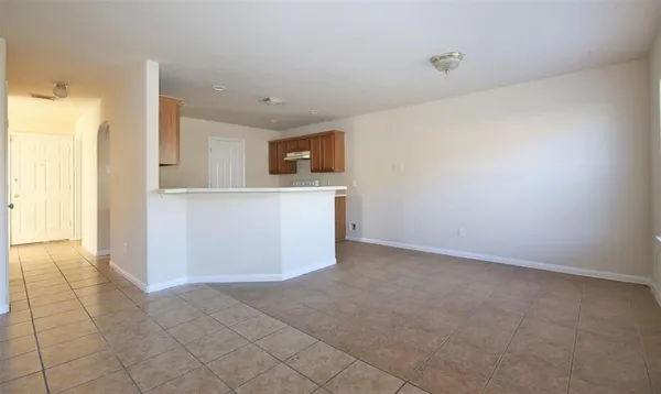 a view of a kitchen with cabinets