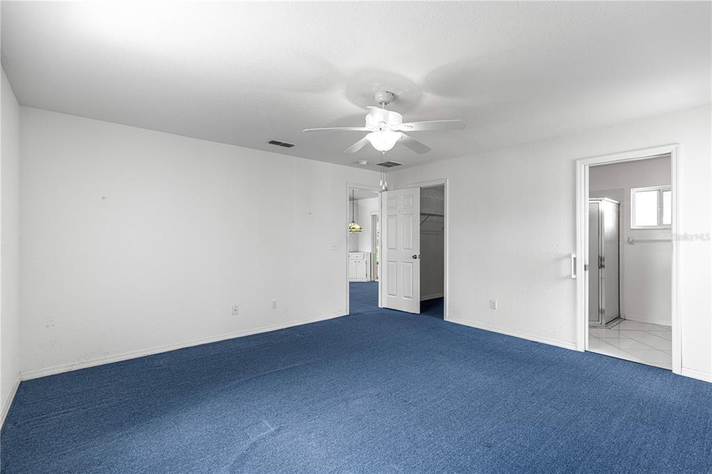 9840 Southwest 63rd Court Ocala, FL 34476 - Photo 9 of 49 an empty room with a bathroom