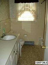 140 Nottingham Road Salisbury, NC 28147 - Photo 6 of 8 a bathroom with a sink and a toilet