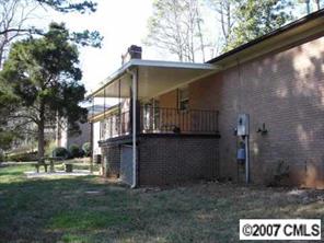 140 Nottingham Road Salisbury, NC 28147 - Photo 7 of 8 a view of a house with a yard