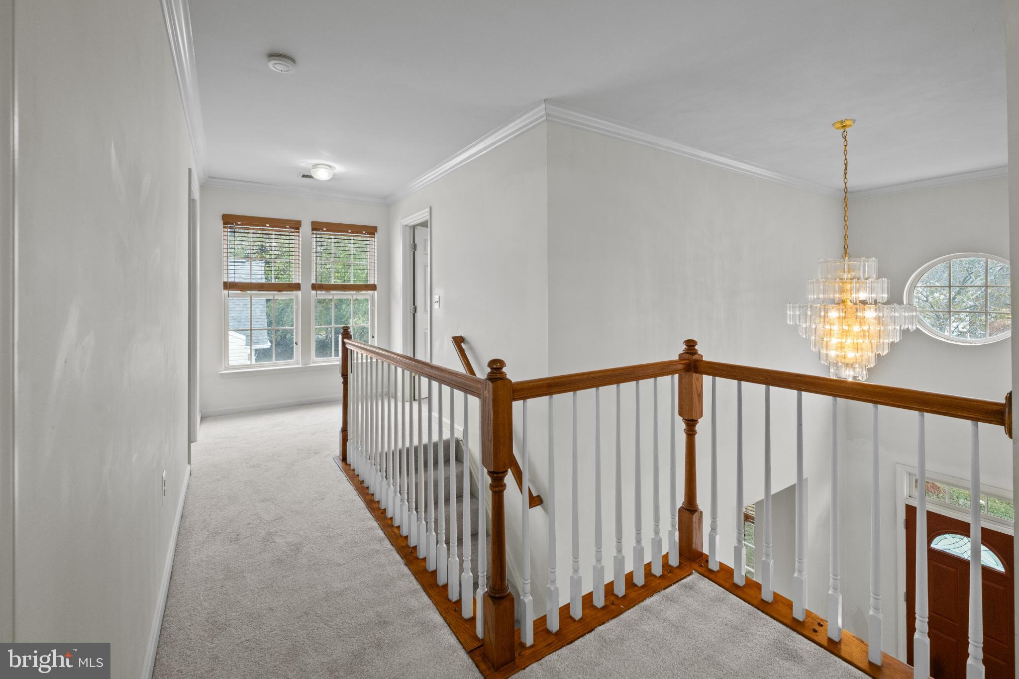 15381 Tina Lane Woodbridge, VA 22193 - Photo 17 of 32 a view of staircase with wooden floor and fan