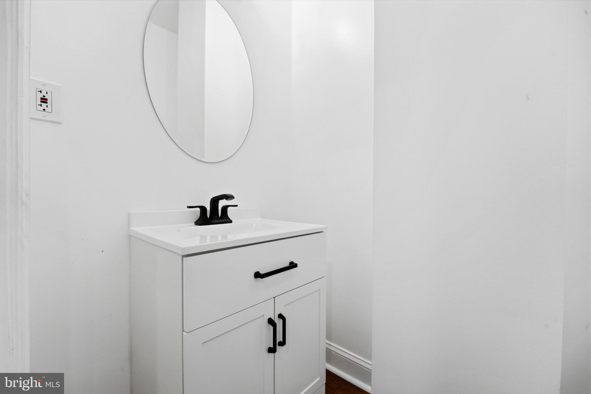 914 5th Street Northeast Washington, DC 20002 - Photo 20 of 36 Sleek, modern bathroom oasis.