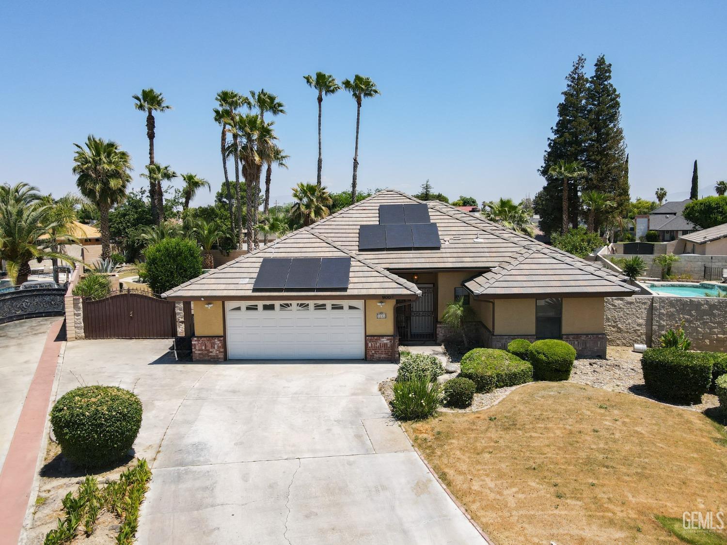 Undisclosed Address Bakersfield, CA 93307 - Photo 2 of 46 a house view with a garden space