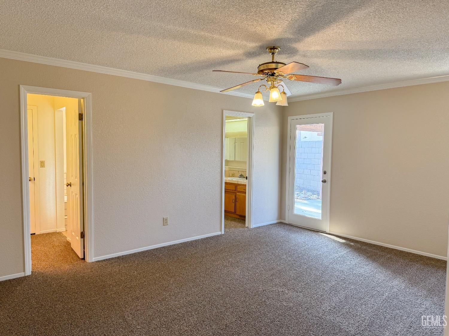 Undisclosed Address Bakersfield, CA 93307 - Photo 21 of 46 a view of a chandelier fan in a room