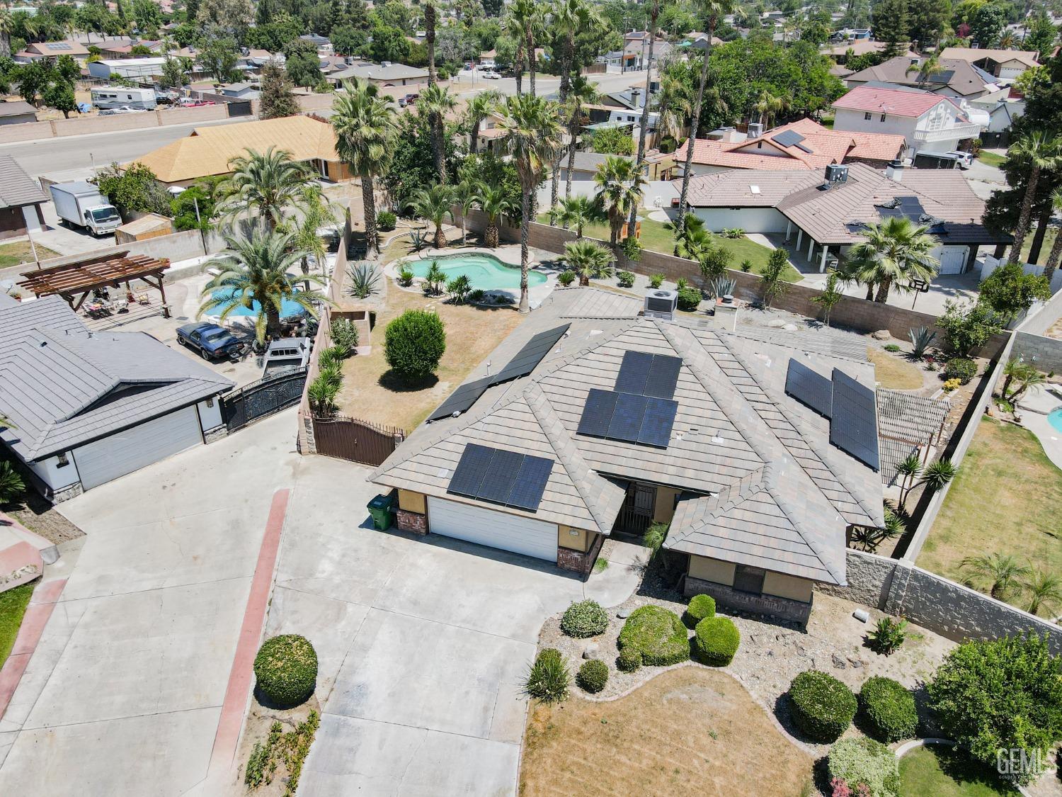 Undisclosed Address Bakersfield, CA 93307 - Photo 3 of 46 an aerial view of residential houses with outdoor space