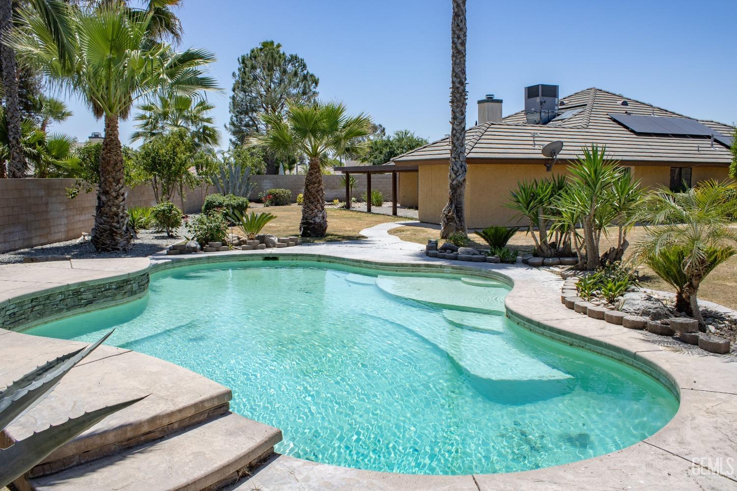 Undisclosed Address Bakersfield, CA 93307 - Photo 35 of 46 a view of a house with a yard patio and sitting area