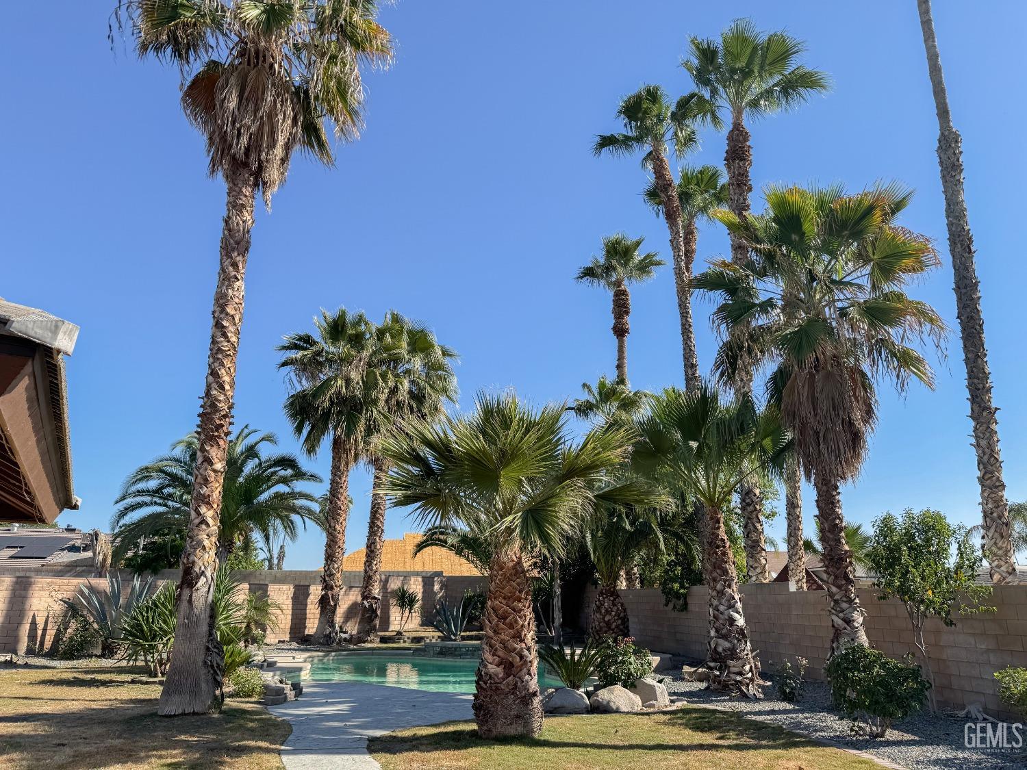 Undisclosed Address Bakersfield, CA 93307 - Photo 36 of 46 a view of outdoor space with palm trees