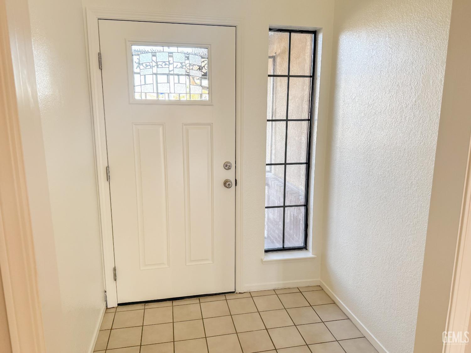 Undisclosed Address Bakersfield, CA 93307 - Photo 4 of 46 an empty room with windows