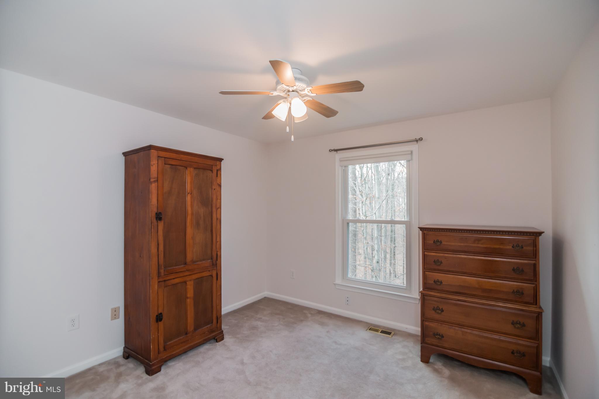 13016 Smoketown Road Woodbridge, VA 22192 - Photo 24 of 30 a view of room with air conditioner and windows