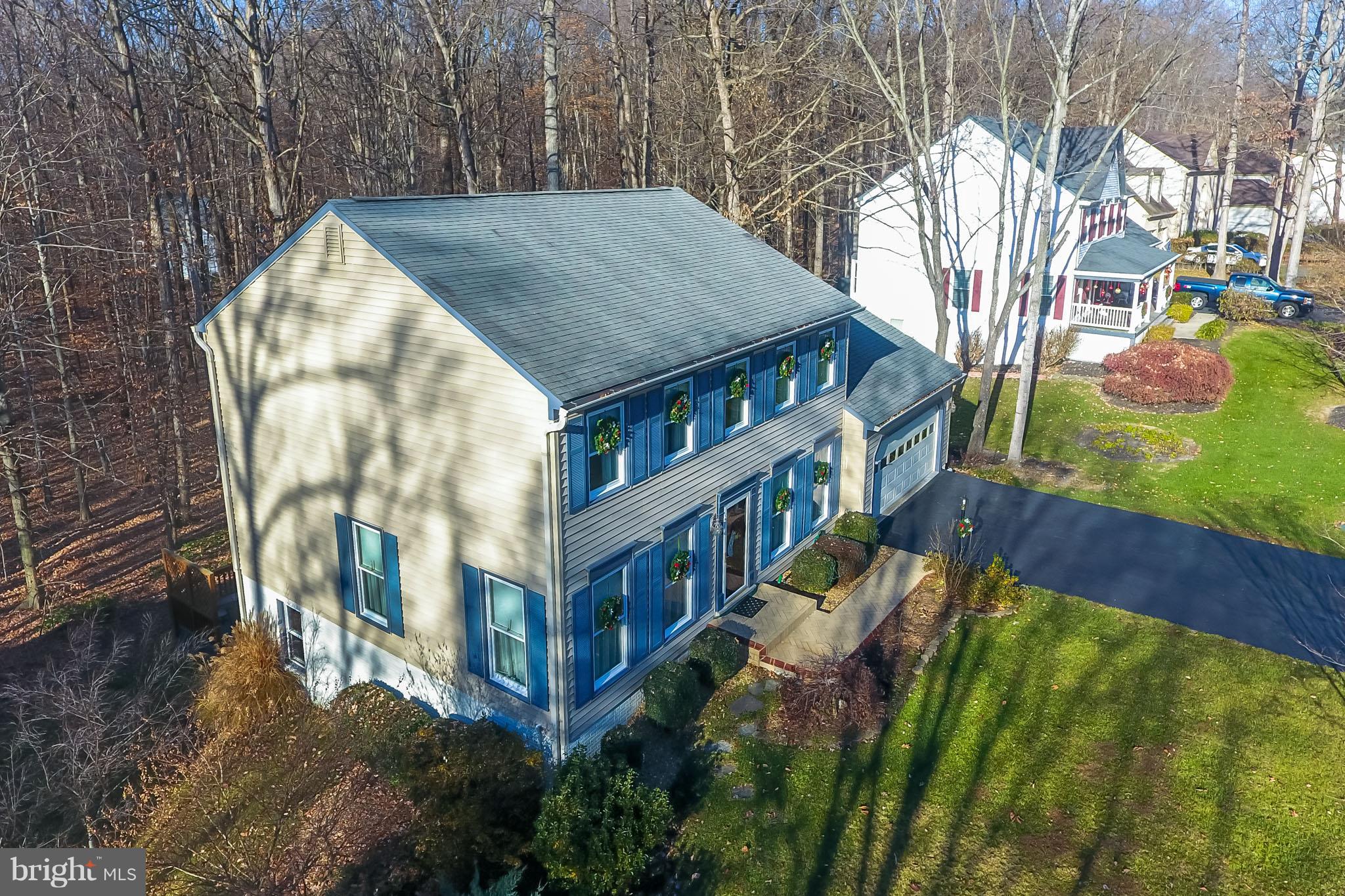 13016 Smoketown Road Woodbridge, VA 22192 - Photo 27 of 30 a view of a house with a yard
