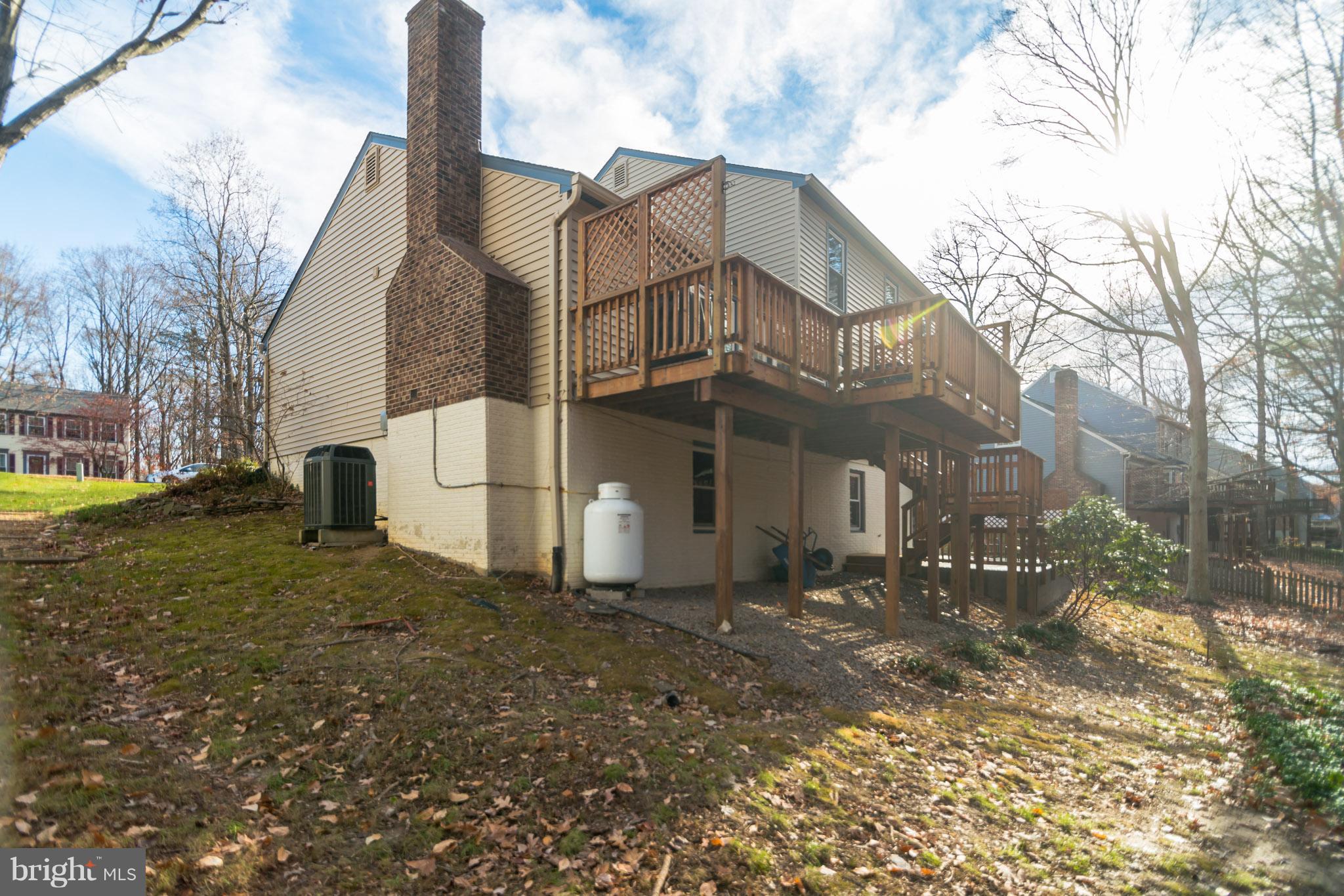 13016 Smoketown Road Woodbridge, VA 22192 - Photo 30 of 30 a view of a house with a yard