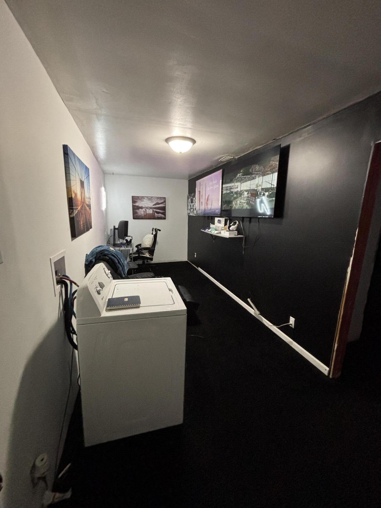 2154 Whitcomb Street Gary, IN 46404 - Photo 4 of 12 a living room with furniture and a flat screen tv