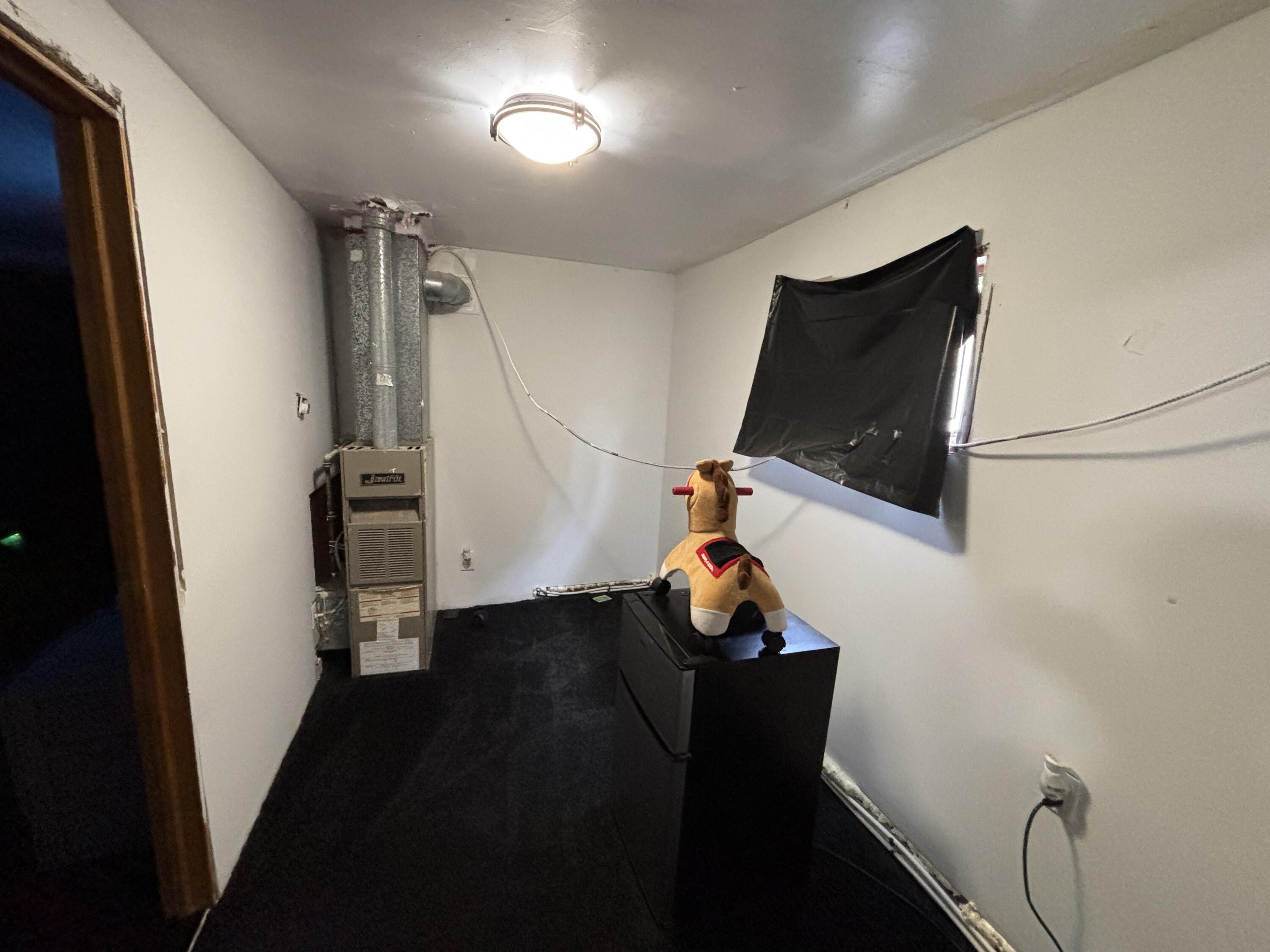 2154 Whitcomb Street Gary, IN 46404 - Photo 5 of 12 a view of entryway with wooden floor