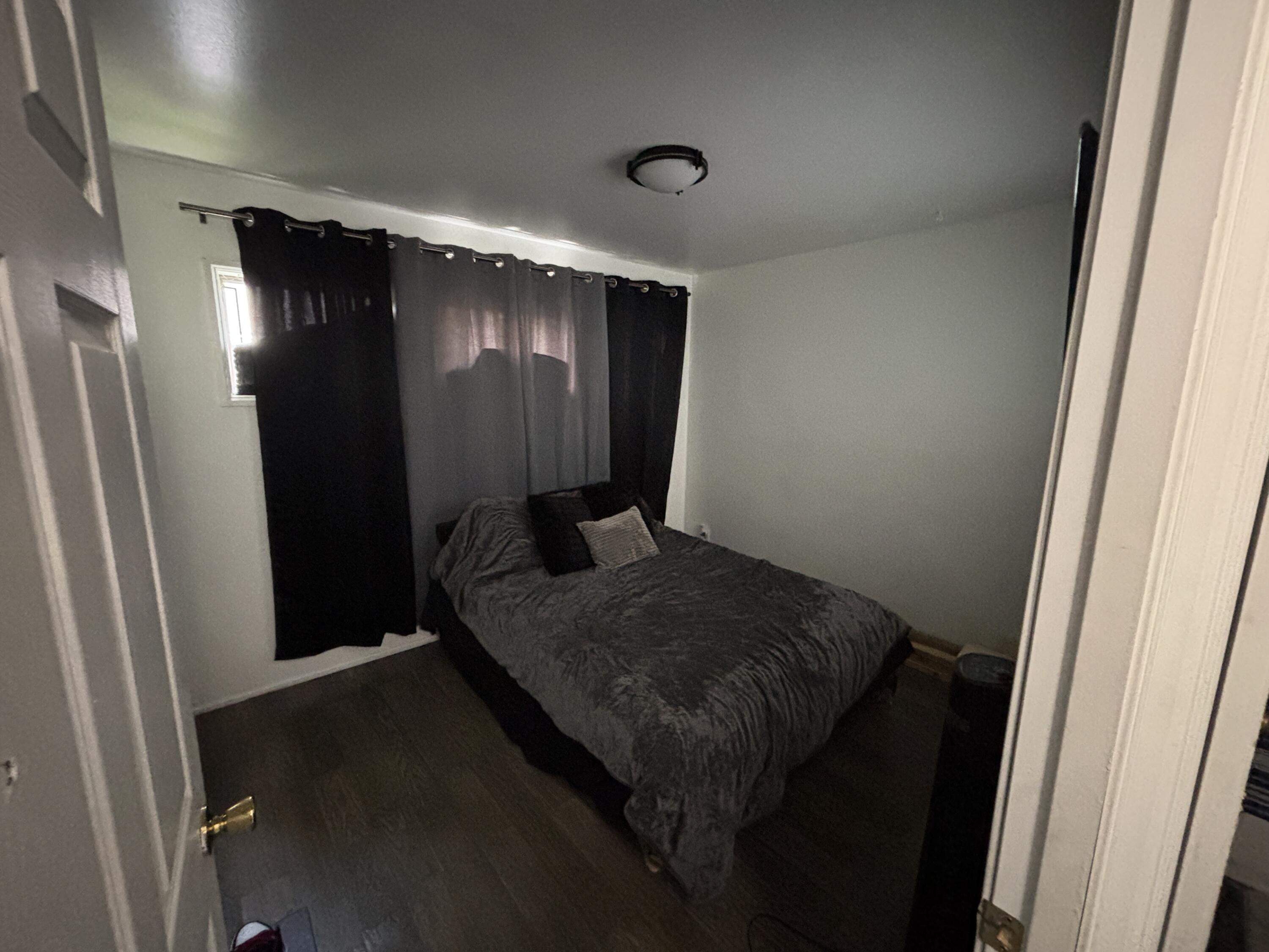 2154 Whitcomb Street Gary, IN 46404 - Photo 8 of 12 a bathroom with a sink and a mirror