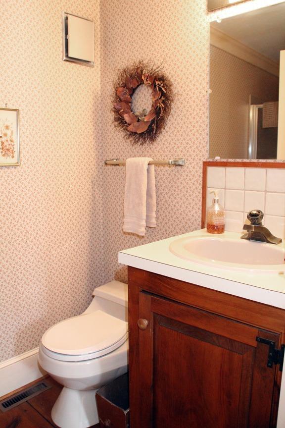 148 Point Hill Road West Barnstable, MA 02668 - Photo 17 of 35 a bathroom with a sink a toilet and mirror