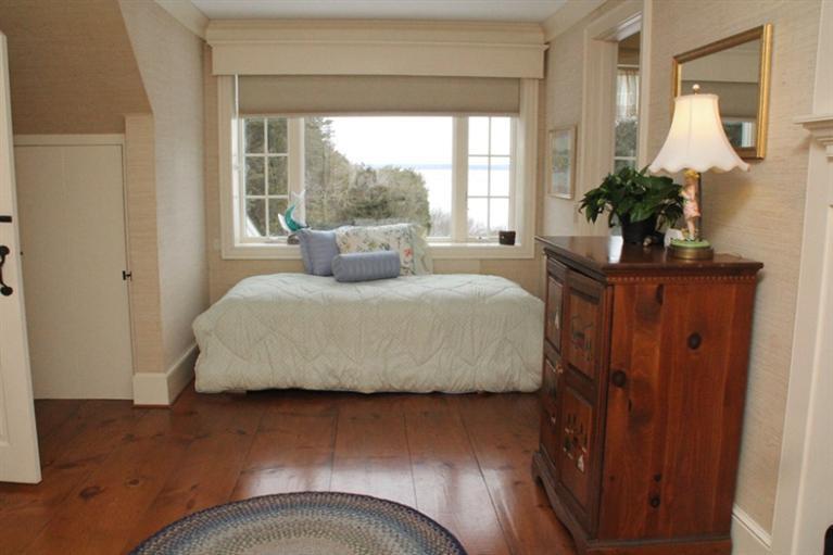 148 Point Hill Road West Barnstable, MA 02668 - Photo 26 of 35 a bedroom with a large bed and a potted plant