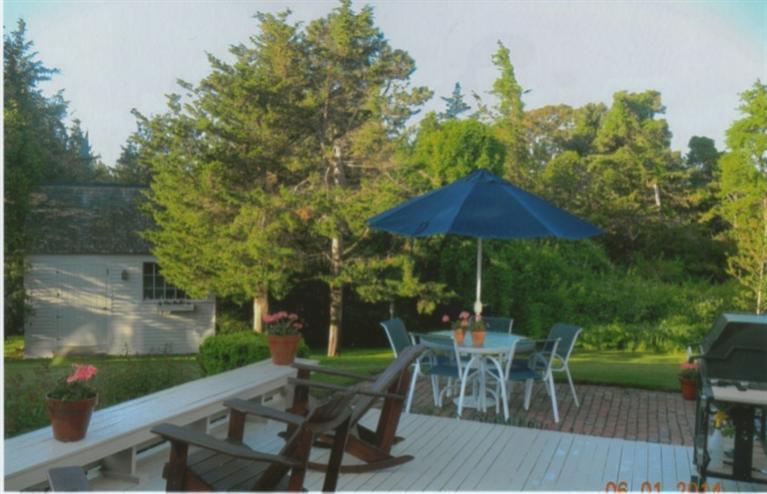 148 Point Hill Road West Barnstable, MA 02668 - Photo 33 of 35 an outdoor space with furniture and umbrella
