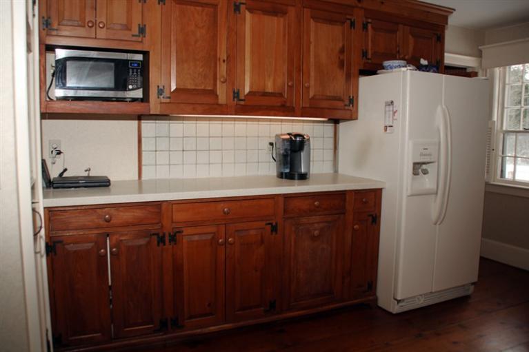 148 Point Hill Road West Barnstable, MA 02668 - Photo 7 of 35 a kitchen with stainless steel appliances granite countertop a refrigerator and a stove top oven