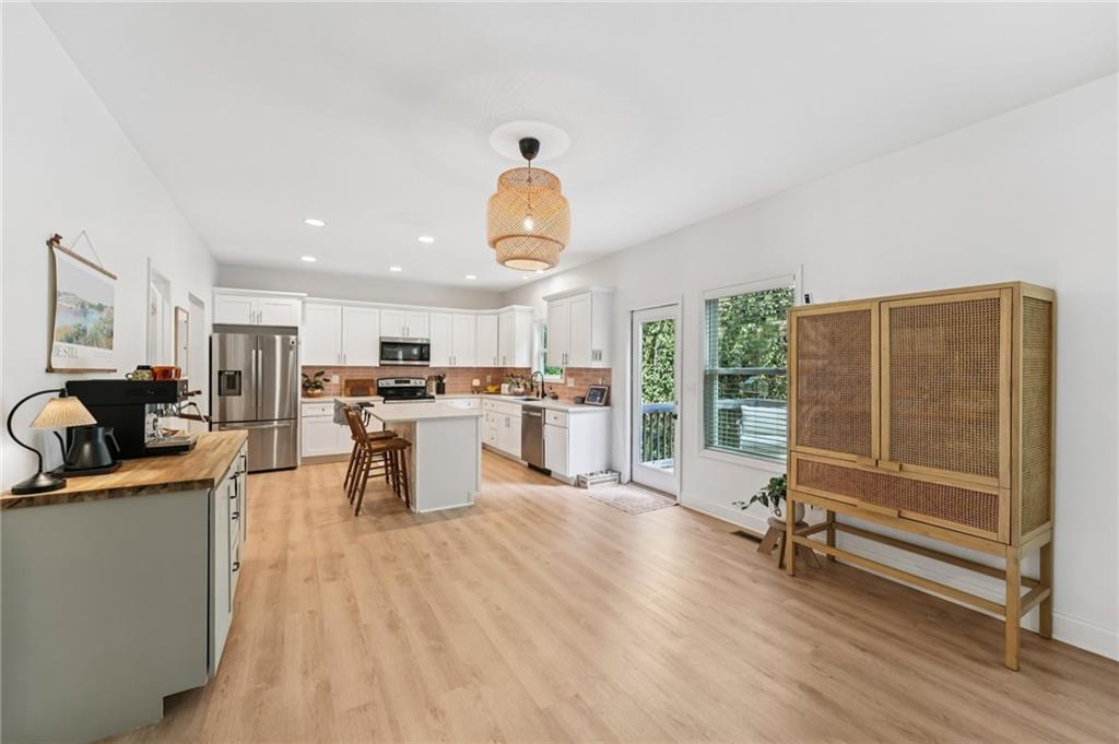 621 Stonehurst Lane Canton, GA 30114 - Photo 13 of 62 a living room with furniture and a large window