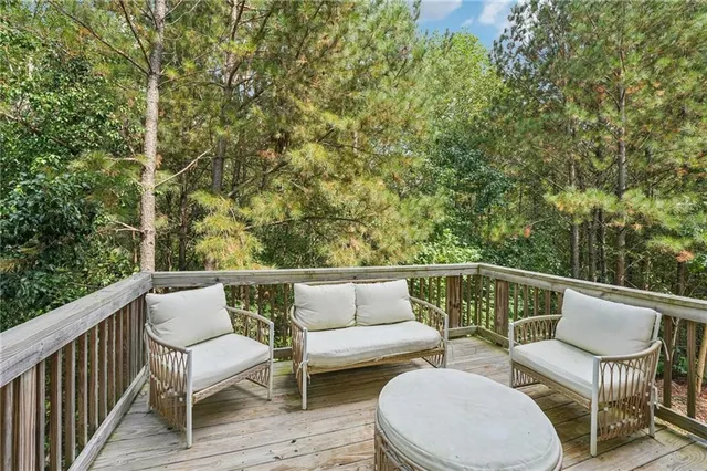 a room with books and a shelf