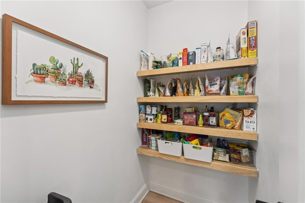 621 Stonehurst Lane Canton, GA 30114 - Photo 21 of 62 a room with books and a shelf