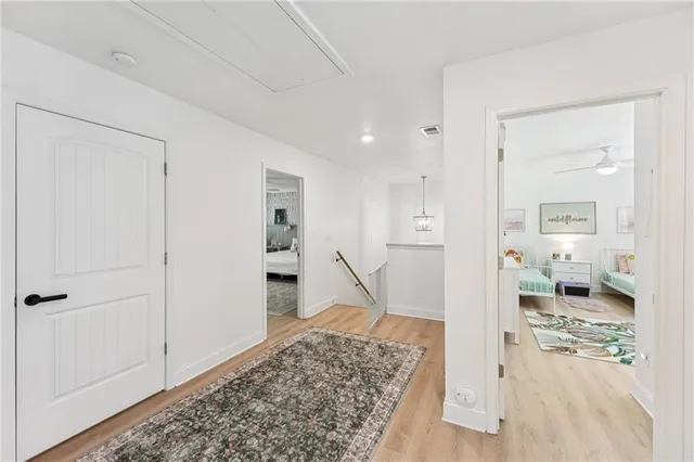 a spacious bathroom with a double vanity sink and a mirror