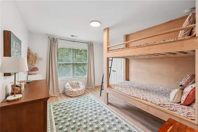 a workspace with furniture and wooden floor