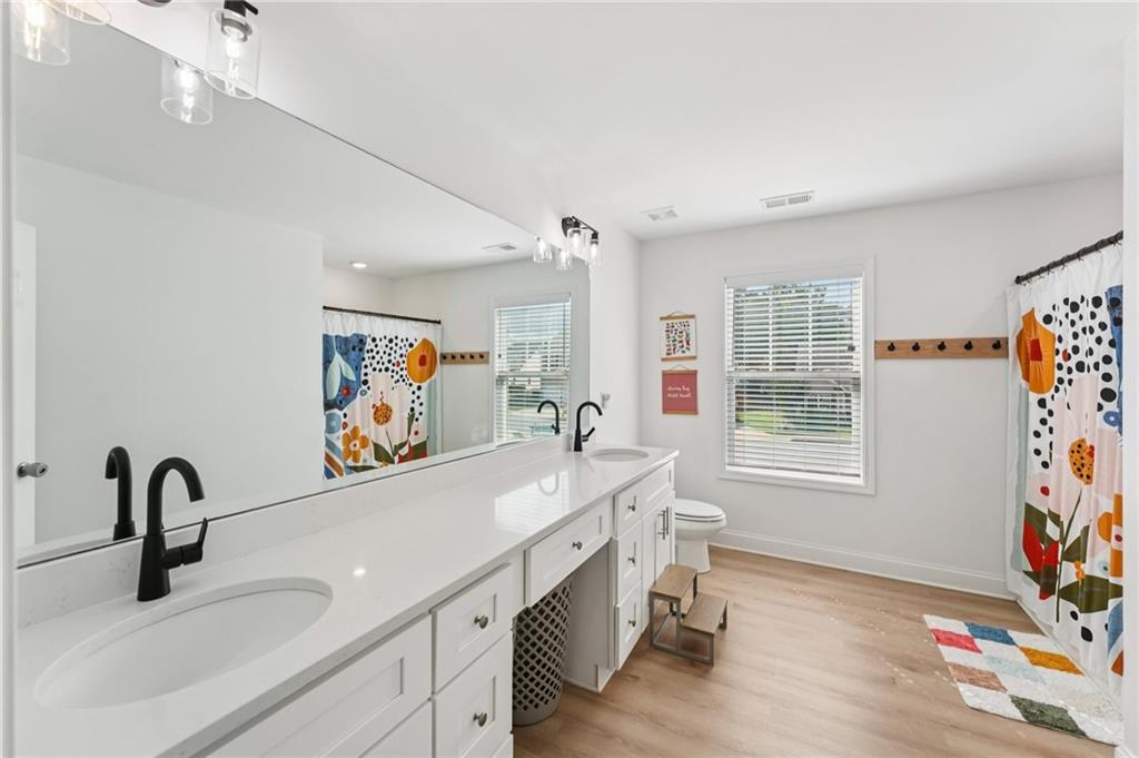 621 Stonehurst Lane Canton, GA 30114 - Photo 38 of 62 a view of a sink and a window in a room