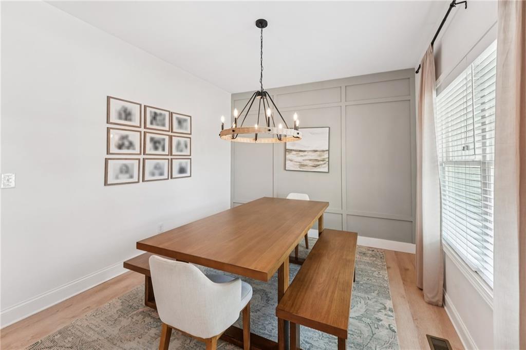 621 Stonehurst Lane Canton, GA 30114 - Photo 5 of 62 a view of a dining room with furniture window and wooden floor