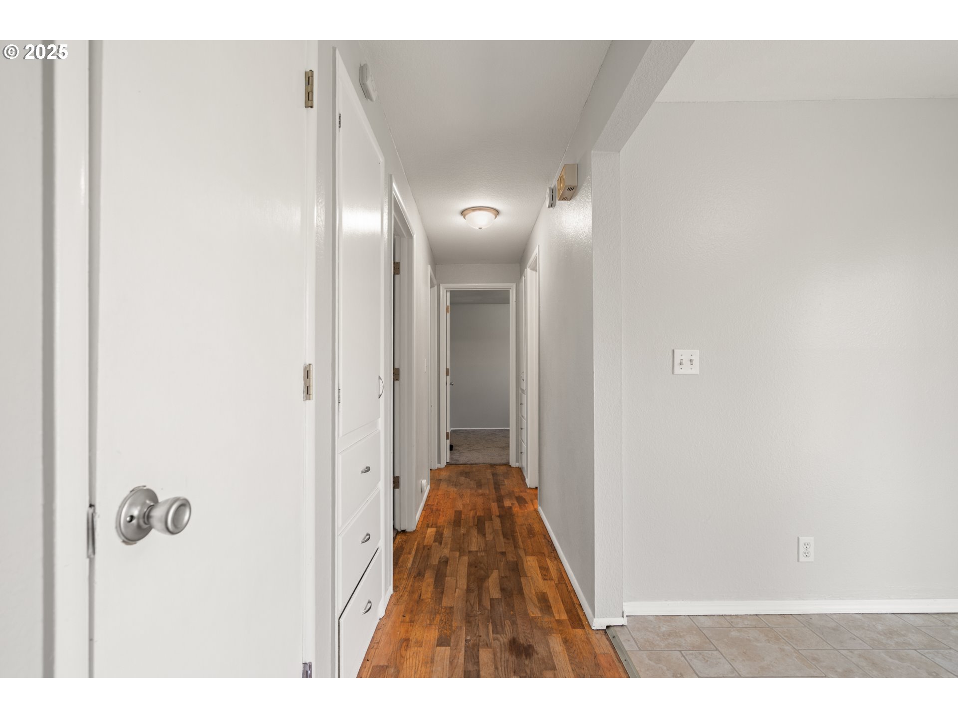 1855 Alderwood Street Eugene, OR 97404 - Photo 12 of 31 a view of a hallway with a dining room