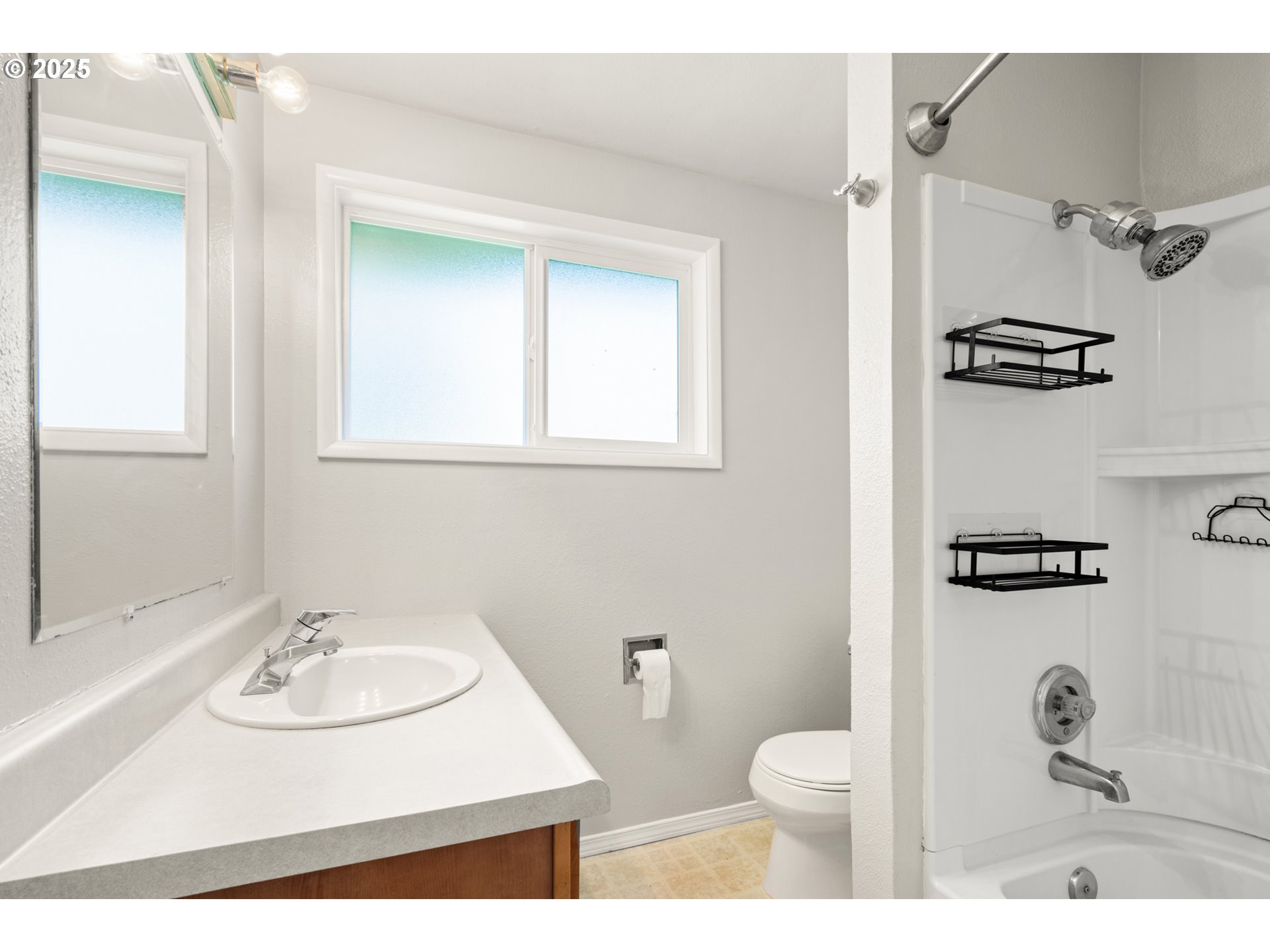 1855 Alderwood Street Eugene, OR 97404 - Photo 14 of 31 a bathroom with a sink toilet and shower