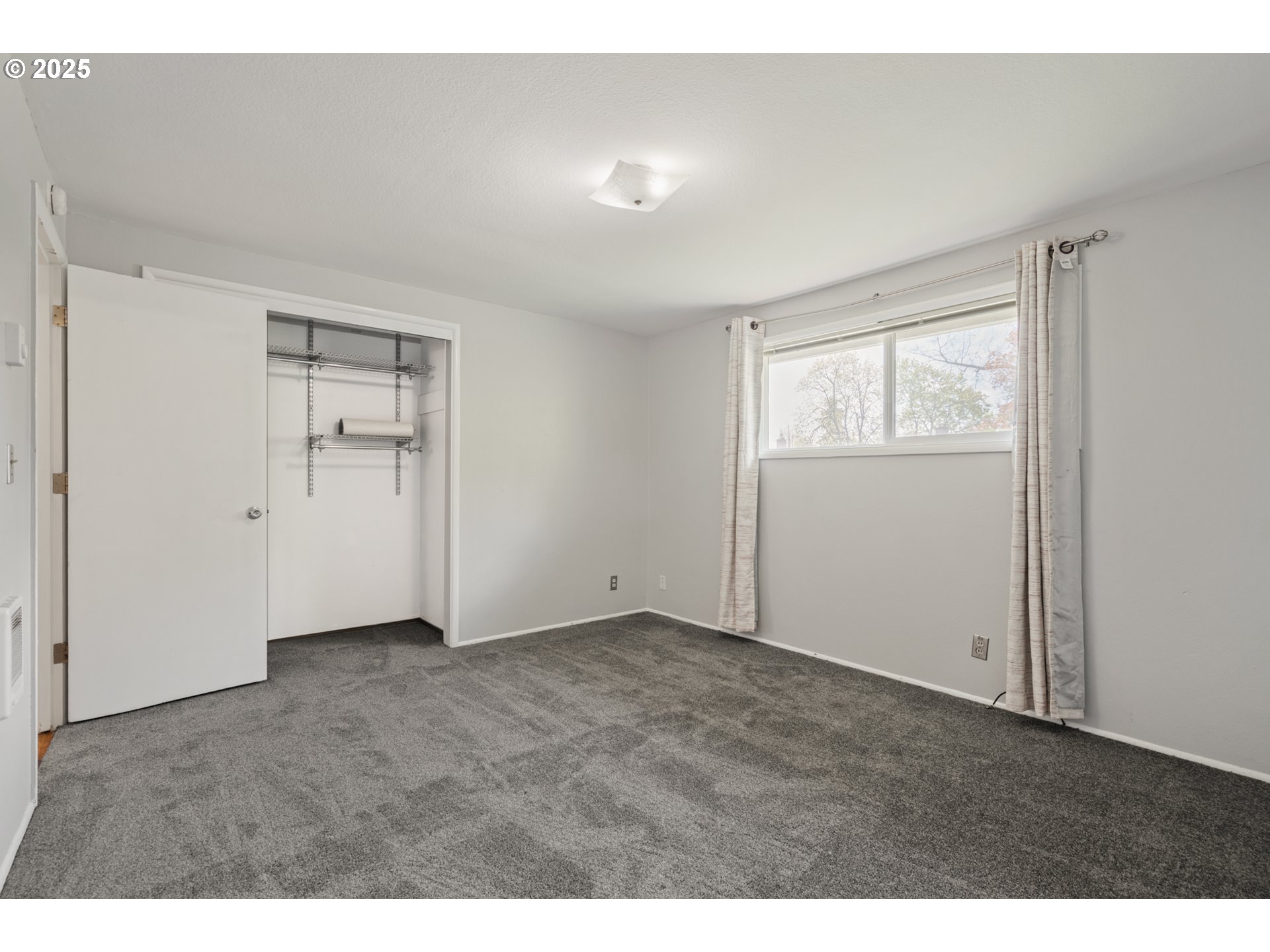 1855 Alderwood Street Eugene, OR 97404 - Photo 20 of 31 an empty room with windows