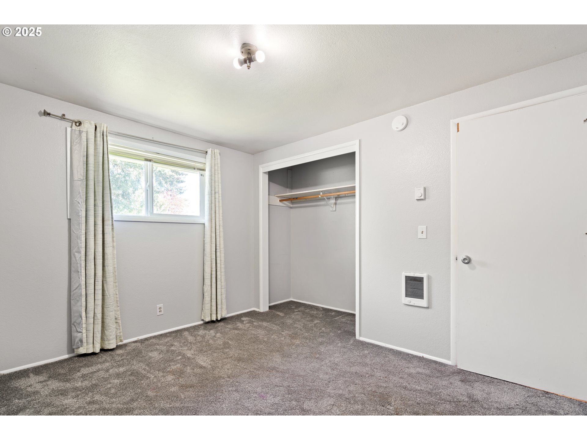 1855 Alderwood Street Eugene, OR 97404 - Photo 24 of 31 a view of an empty room with a window