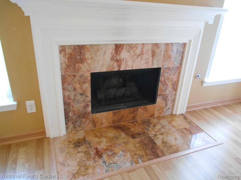 3490 Oakmonte Boulevard, Unit 126 Rochester, MI 48306 - Photo 13 of 53 marble fireplace