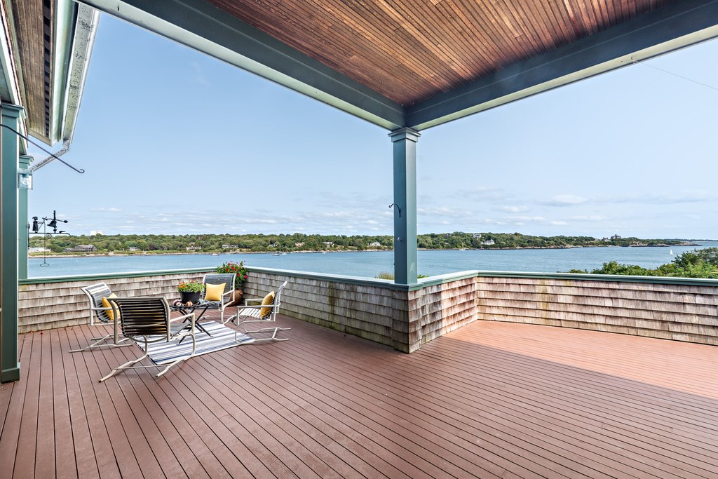 147 Beavertail Road Jamestown, RI 02835 - Photo 2 of 46 Mahogany deck with covered porch.