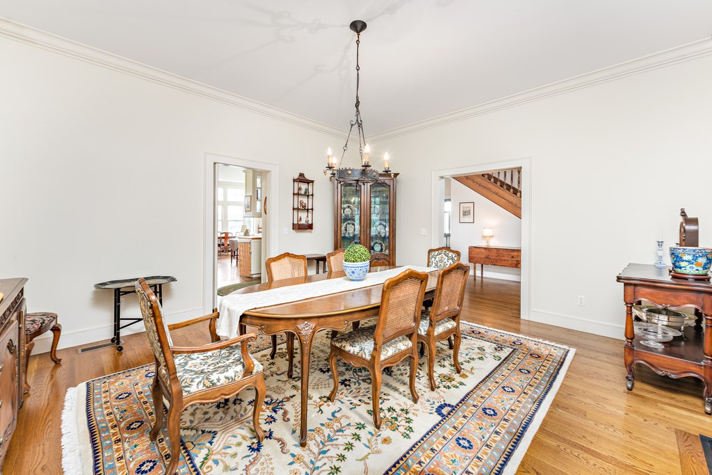 147 Beavertail Road Jamestown, RI 02835 - Photo 24 of 46 Formal dining room. Door to kitchen and one to front hallway.