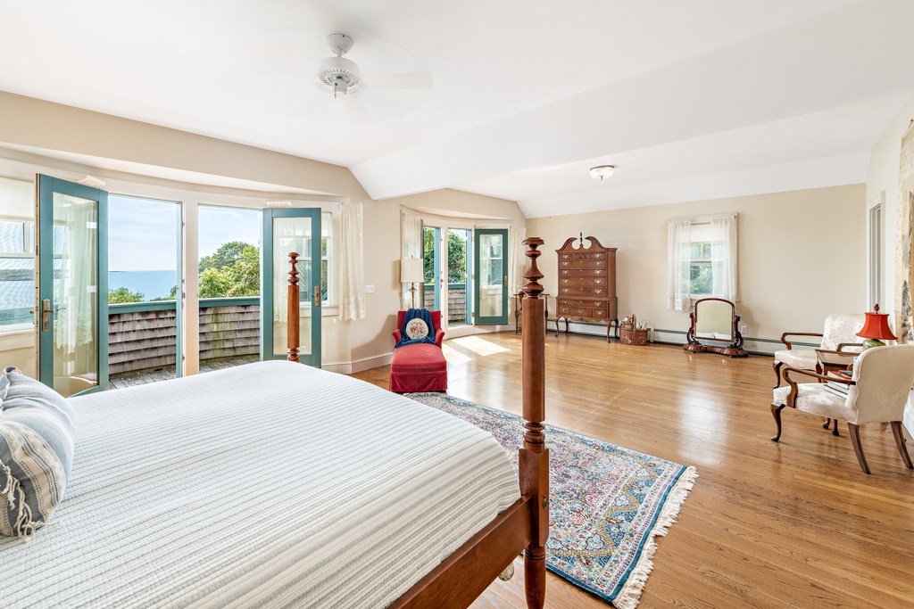 147 Beavertail Road Jamestown, RI 02835 - Photo 30 of 46 Master bedroom with 2 balconies and sitting room.