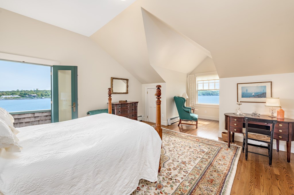 147 Beavertail Road Jamestown, RI 02835 - Photo 34 of 46 Guest bedroom with balcony facing east and oversized window facing mouth of cove.