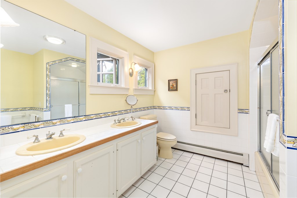 147 Beavertail Road Jamestown, RI 02835 - Photo 35 of 46 Guest bathroom with linen closet.