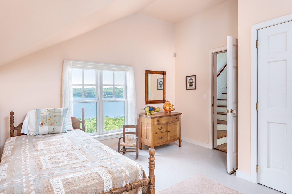 147 Beavertail Road Jamestown, RI 02835 - Photo 37 of 46 Water views over garage bedroom off of back stairway.