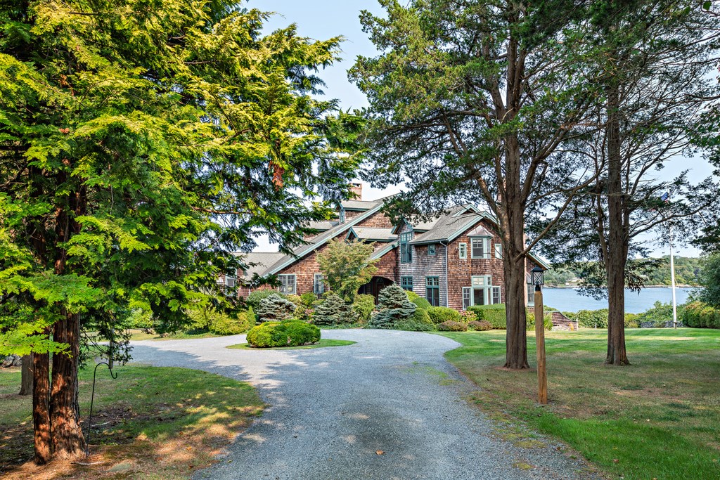 147 Beavertail Road Jamestown, RI 02835 - Photo 10 of 46 Cedar trees line the front circular driveway and the home is set back from road for ample privacy.