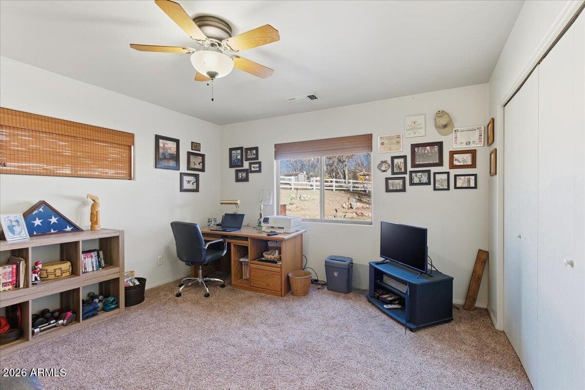 4605 Caughran Road Camp Verde, AZ 86322 - Photo 30 of 34 a view of a livingroom with workspace and a couch
