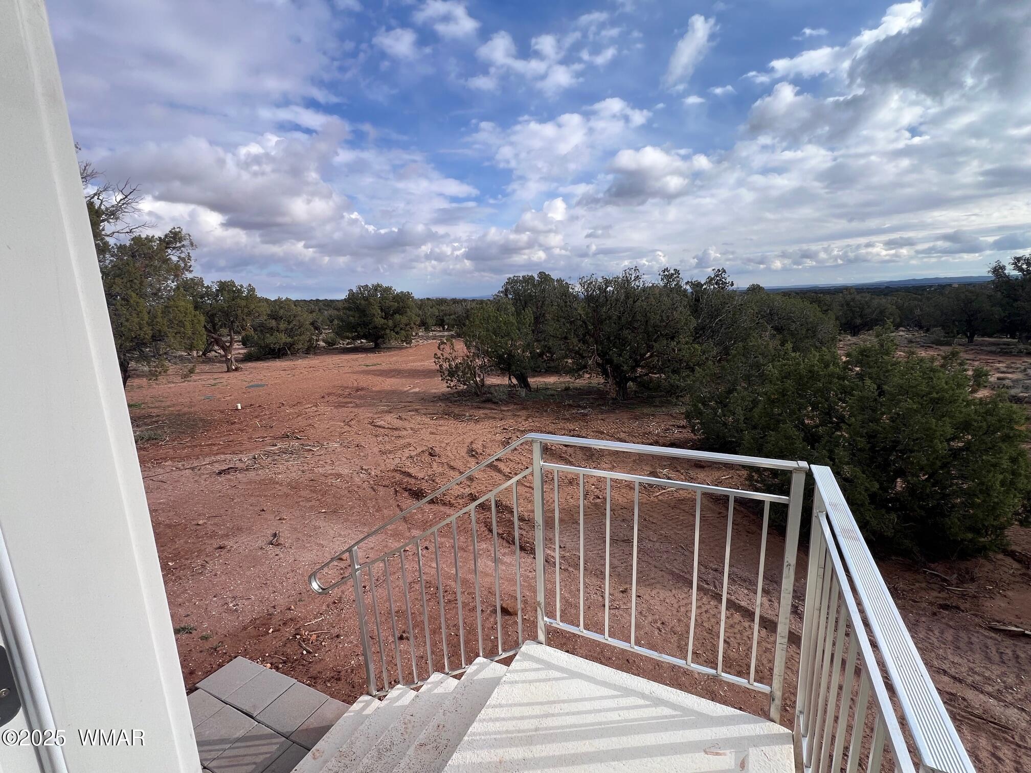 4129 Apache Road Snowflake, AZ 85937 - Photo 24 of 48 a view of balcony with wooden floor and fence