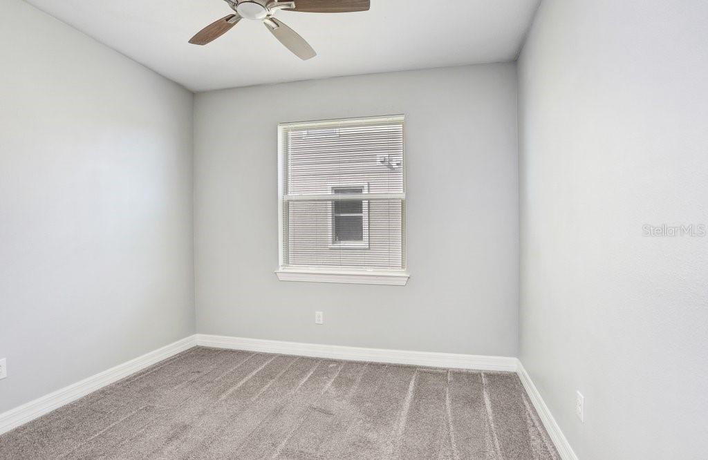 11677 Brighton Knoll Loop Riverview, FL 33579 - Photo 11 of 30 an empty room with a window