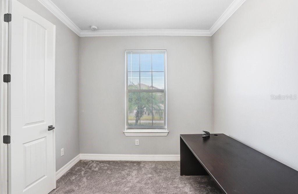11677 Brighton Knoll Loop Riverview, FL 33579 - Photo 7 of 30 a room that has a window in it