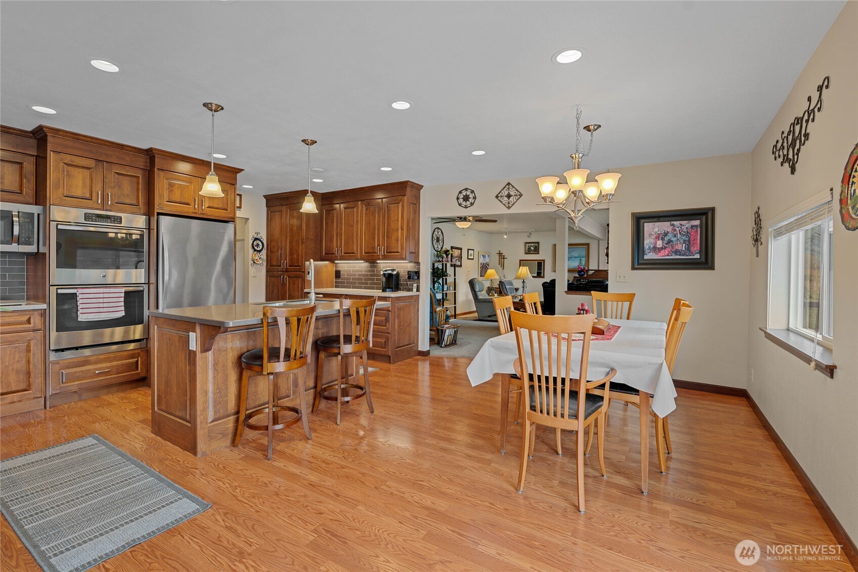 2548 Entiat Way Entiat, WA 98822 - Photo 11 of 40 a view of a dining room with furniture window and wooden floor
