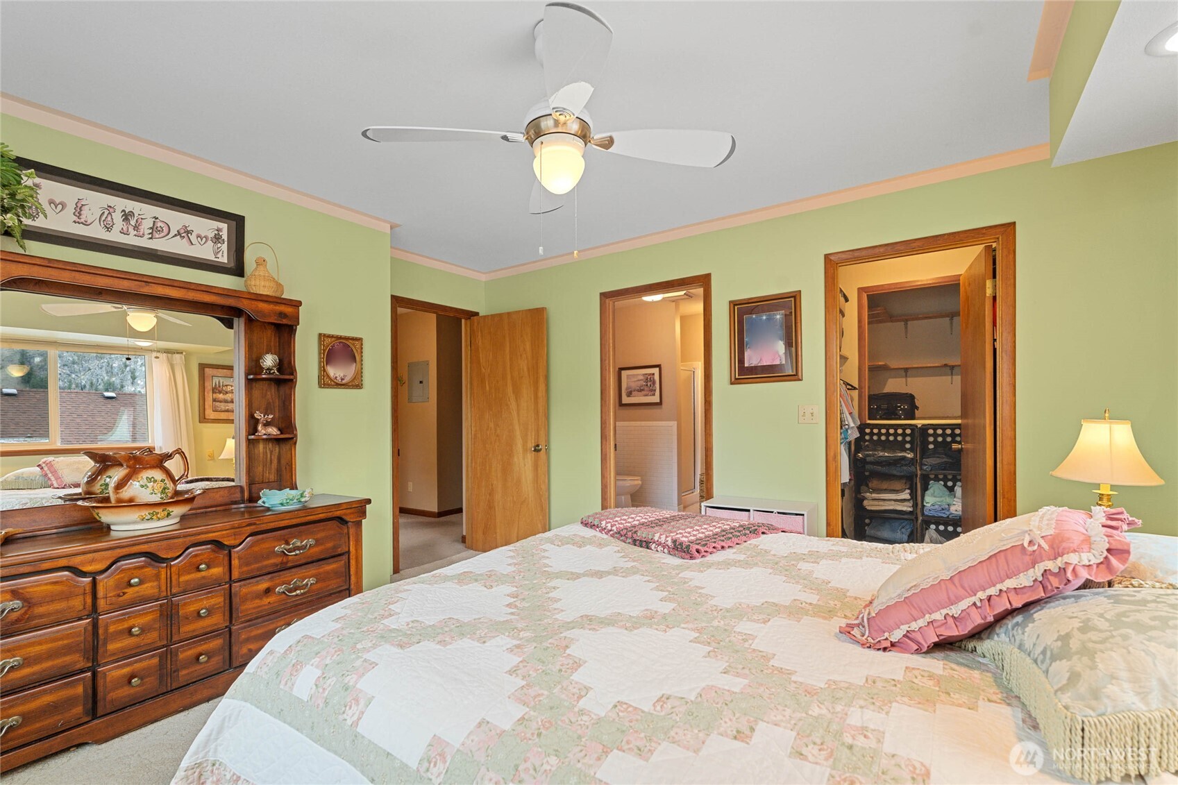 2548 Entiat Way Entiat, WA 98822 - Photo 14 of 40 a bedroom with bed and wooden floor