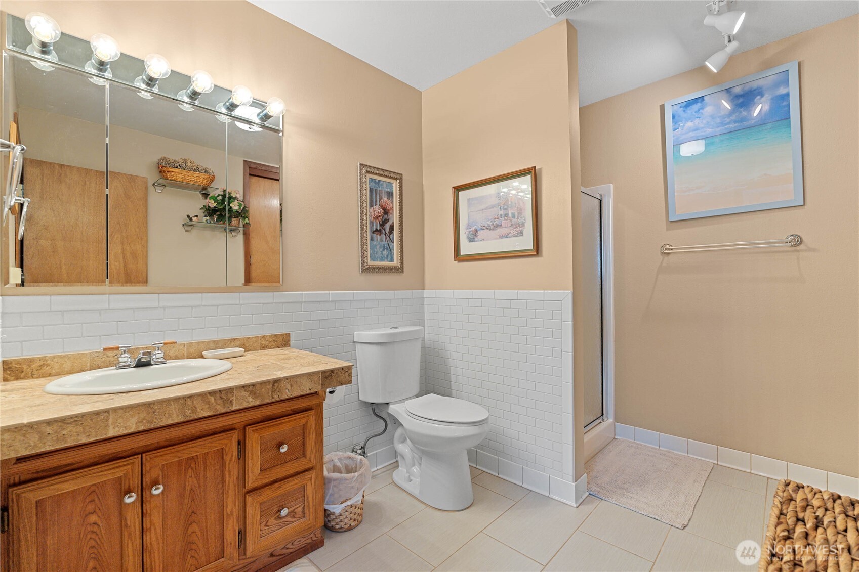 2548 Entiat Way Entiat, WA 98822 - Photo 15 of 40 a bathroom with a granite countertop toilet sink and mirror